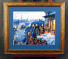 Картина с видом на вечерний город с балкона в золотой раме с паспарту