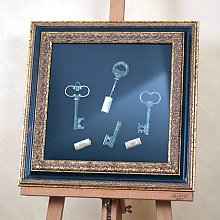 Антикварные немецкие штопоры в раме под стеклом